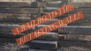 Mountain Movers Installs Railroad Tie Retaining Wall [upl. by Airda]