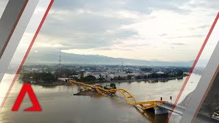 Drone footage of tsunamihit Indonesian city Palu [upl. by Elspet686]