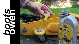 Filling a trolley jack with oil [upl. by Zina]